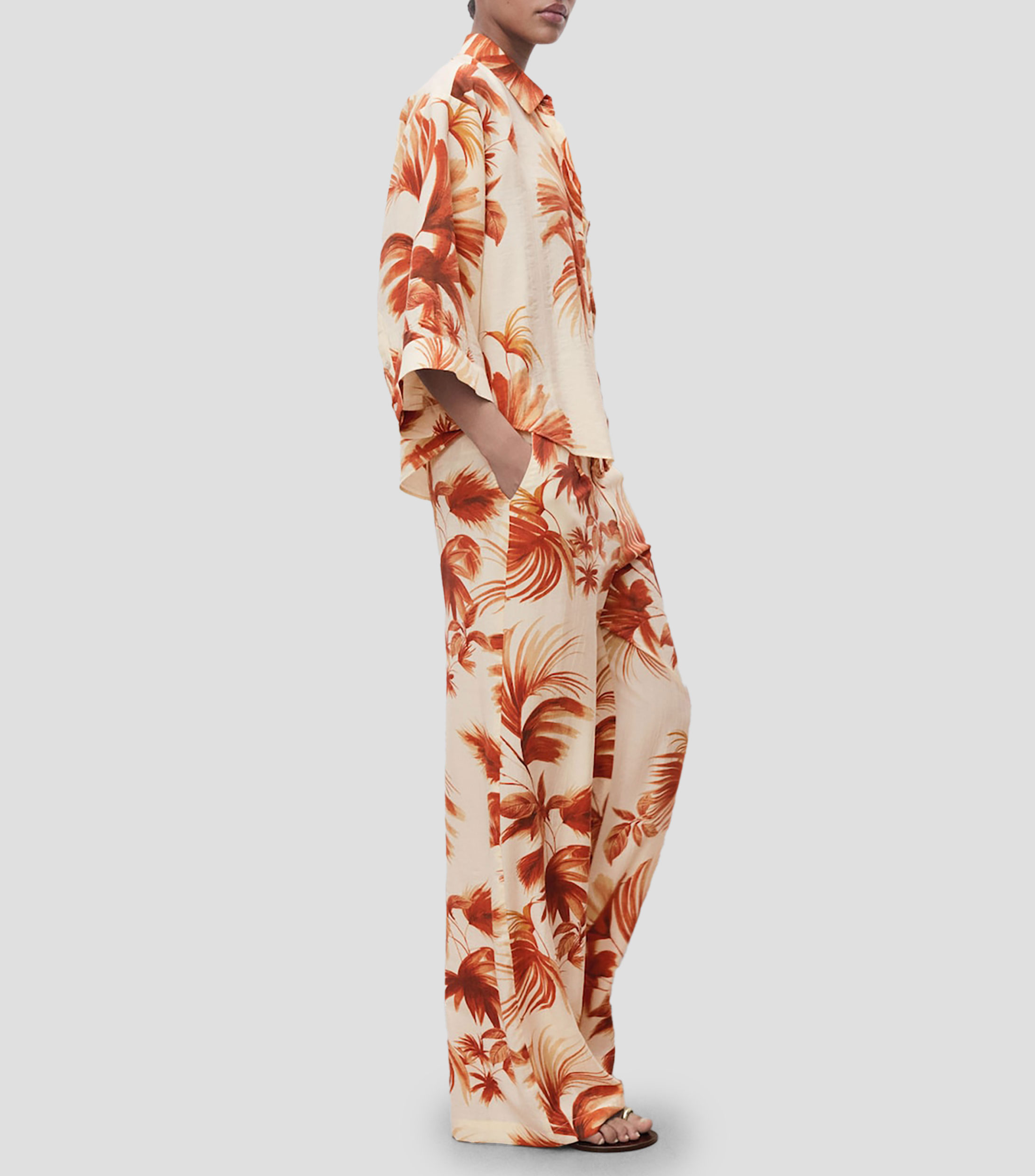 Pantalón con palmeras Mujer